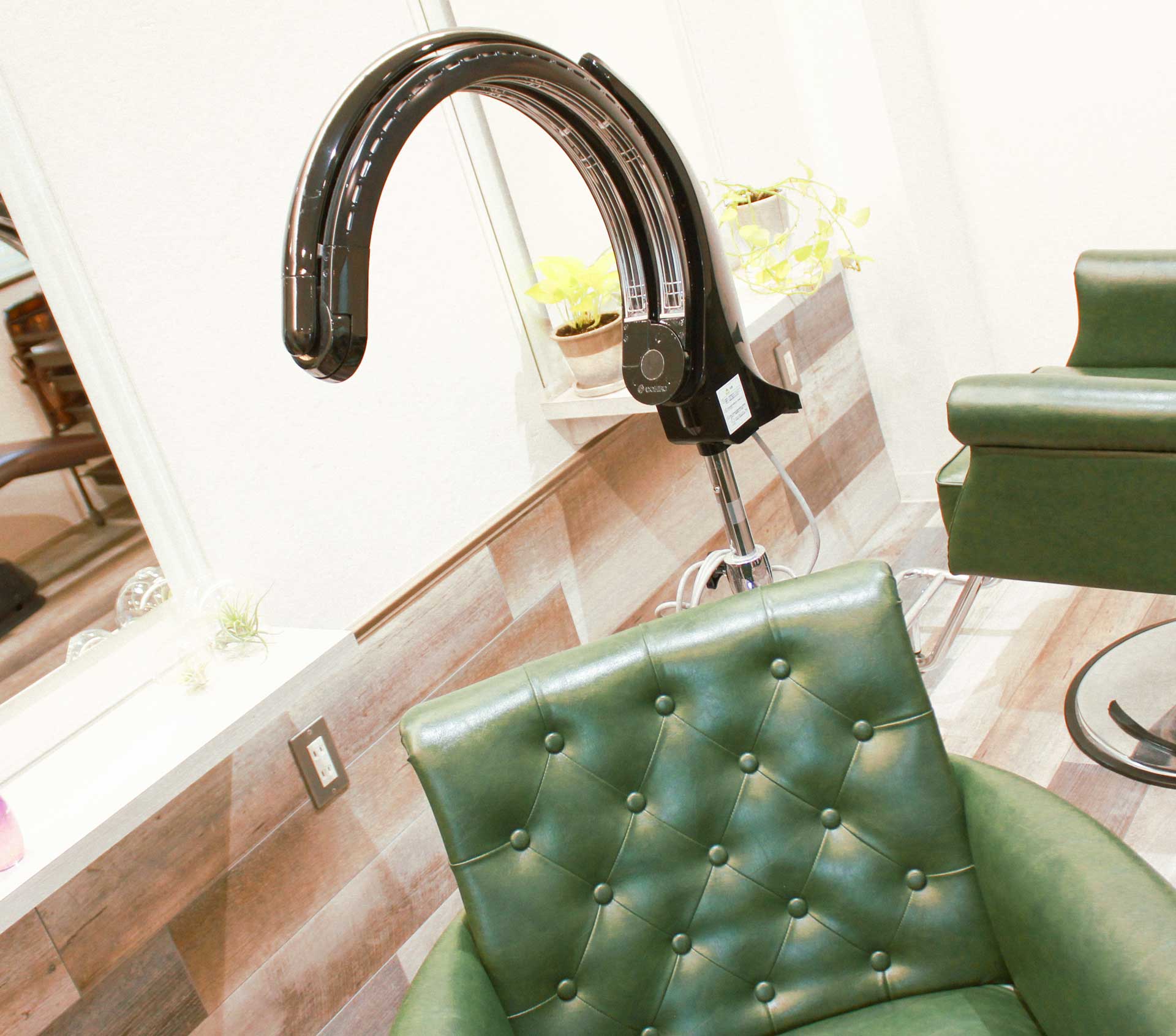 パーマを定着させる機械